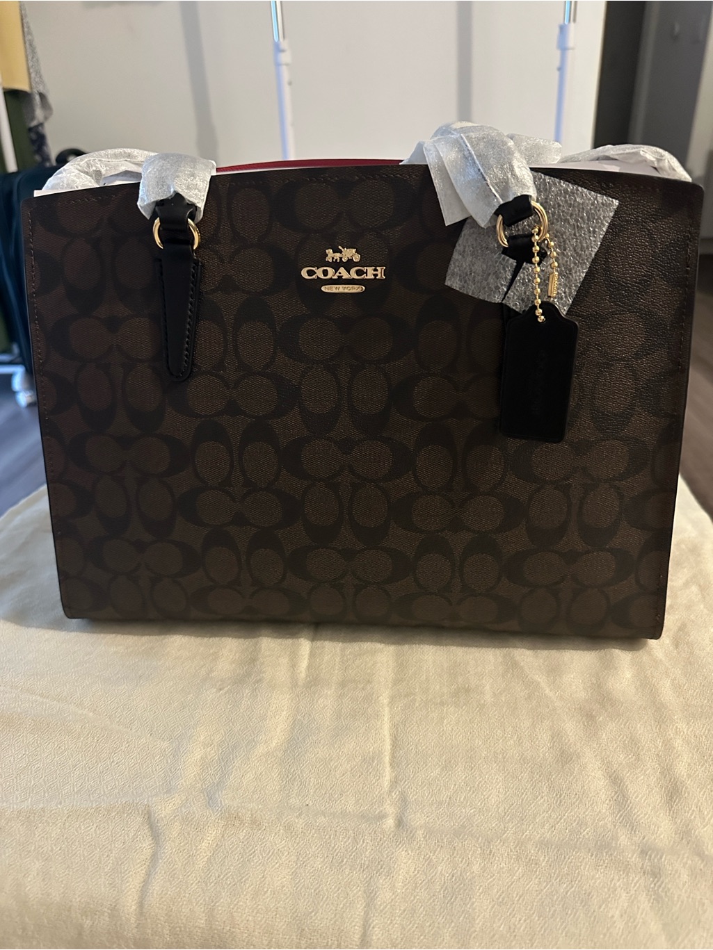 Coach Dark Brown Signature Tote With Black Handles And Gold Hardware